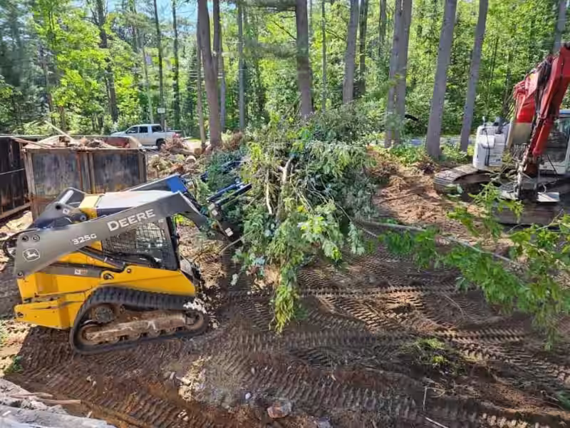 Full-scale lot clearing and brush removal for a new construction site in Theodore.